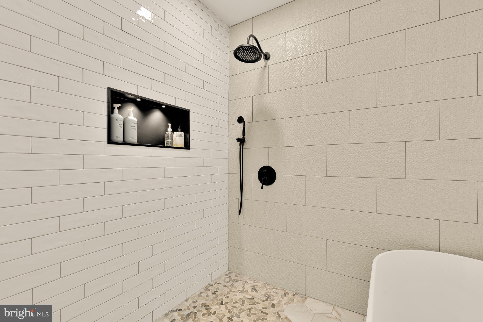 2208 East Baltimore Street Baltimore, MD 21231 - Photo 26 of 46 a bathroom with a shower