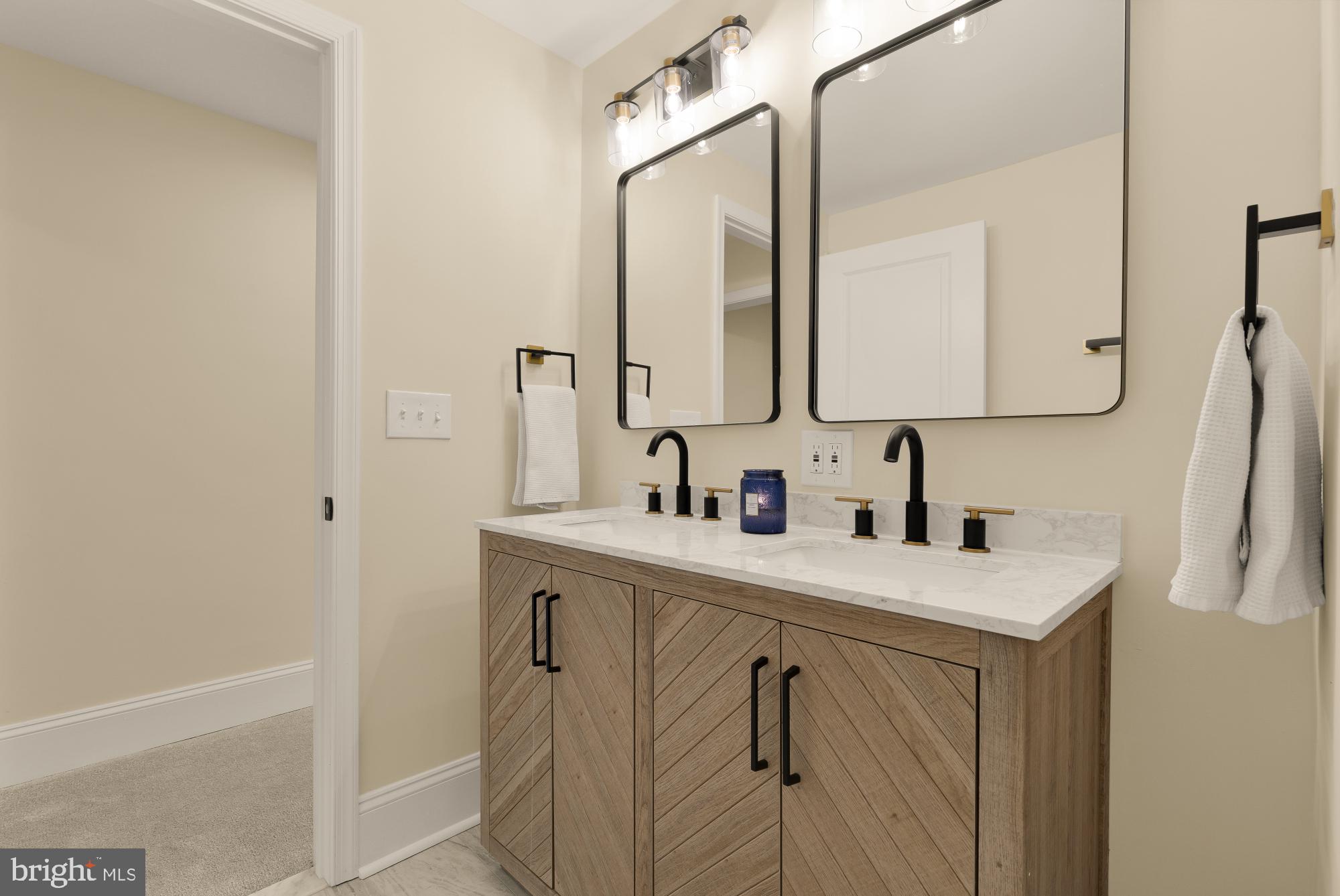 2208 East Baltimore Street Baltimore, MD 21231 - Photo 31 of 46 a bathroom with a sink and a mirror