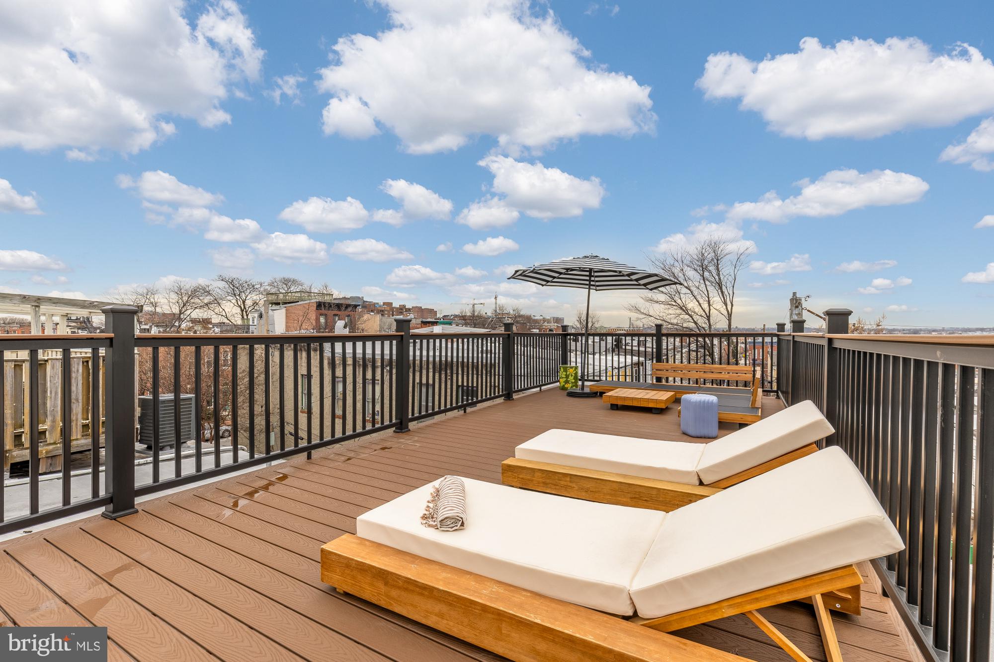 2208 East Baltimore Street Baltimore, MD 21231 - Photo 38 of 46 a view of a roof deck with couches