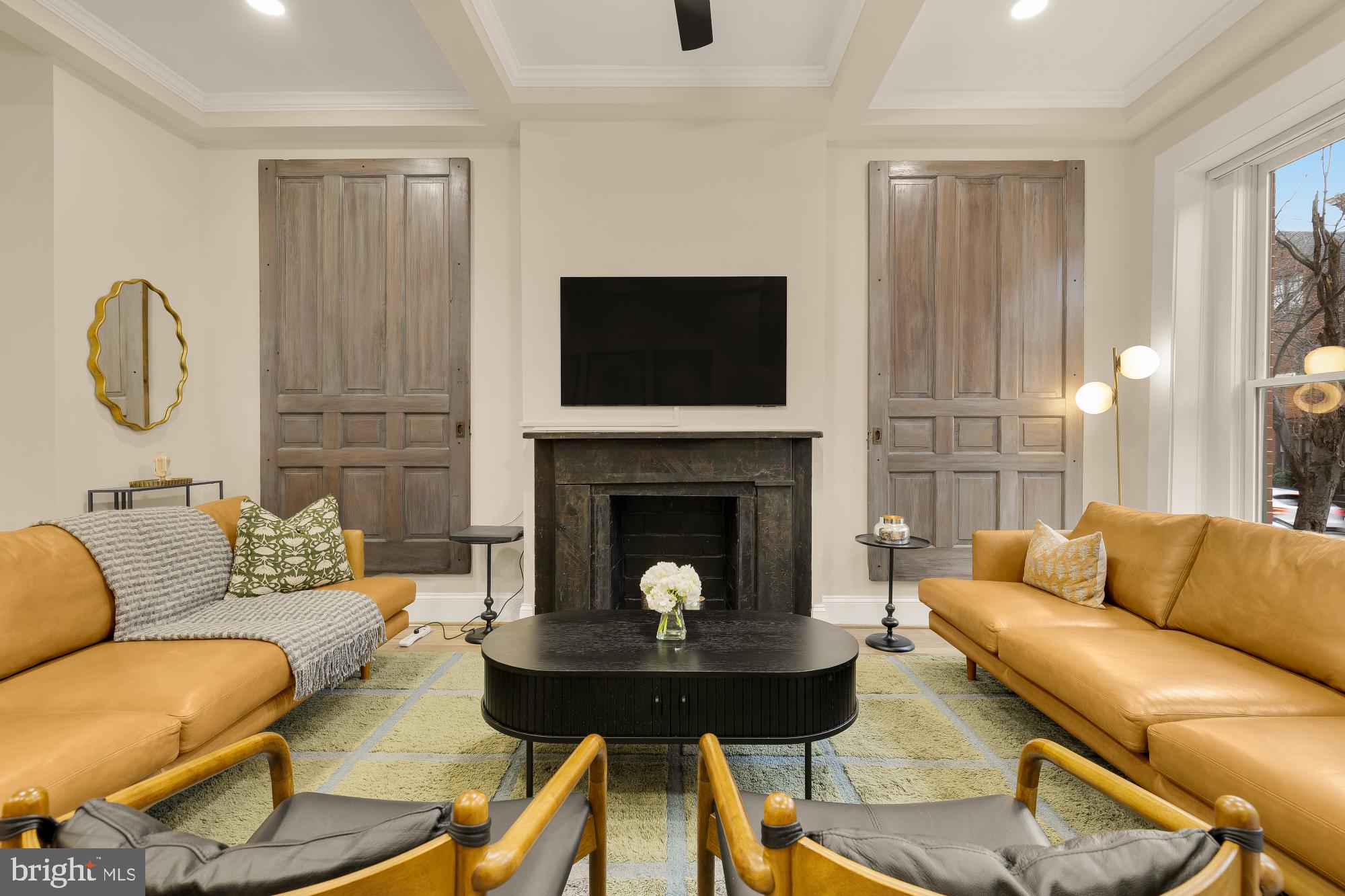 2208 East Baltimore Street Baltimore, MD 21231 - Photo 4 of 46 a living room with furniture and a fireplace