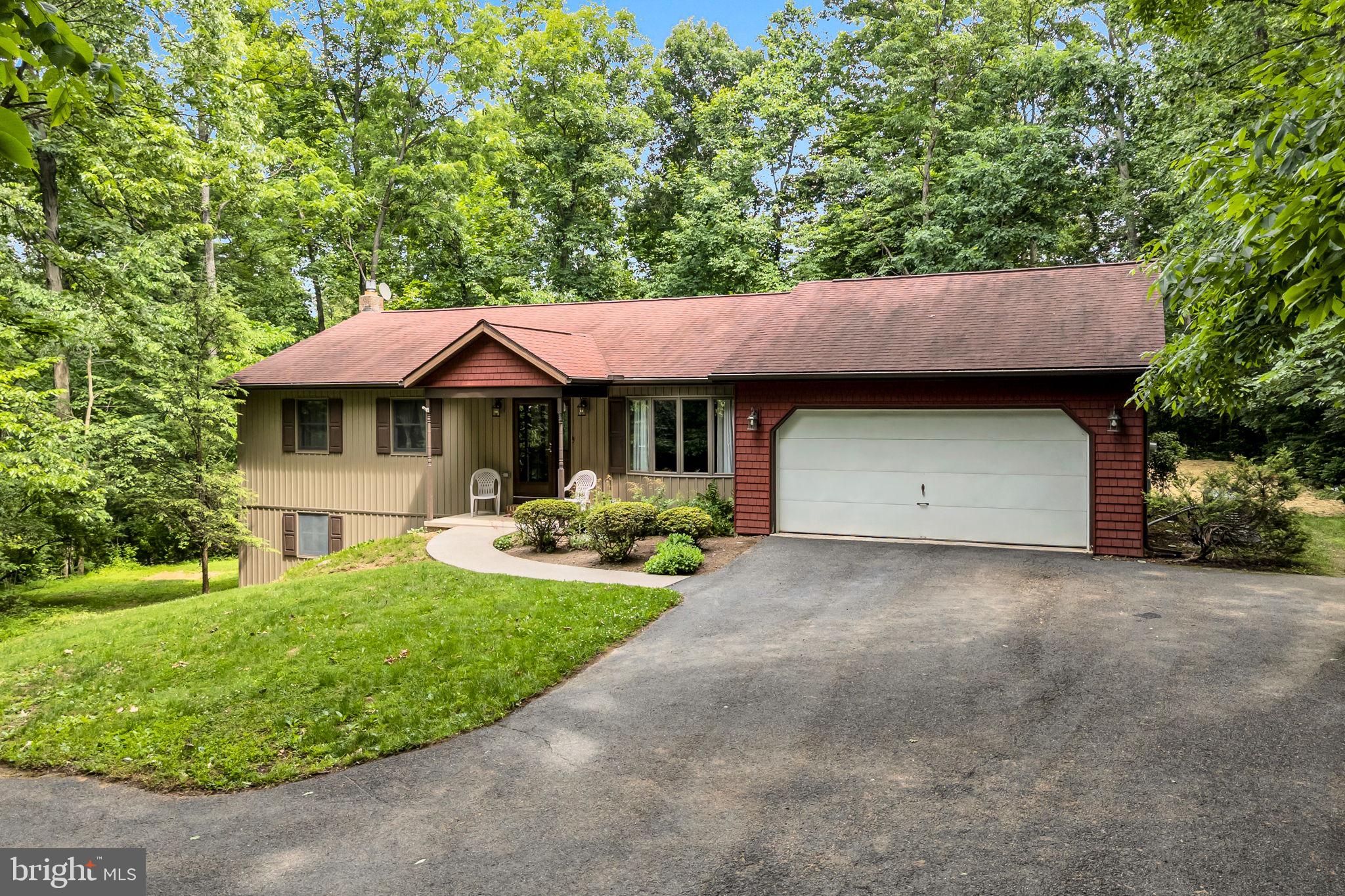 350 Poplar Road Dillsburg, PA 17019 - Photo 4 of 44 Charming home nestled in lush greenery.