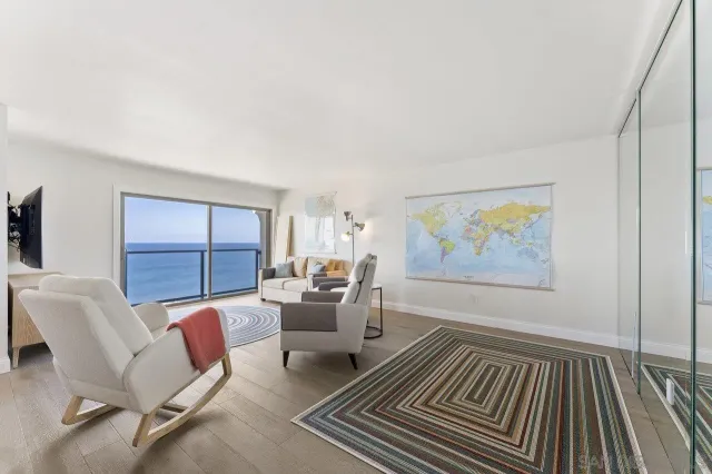 a view of a livingroom with furniture and window