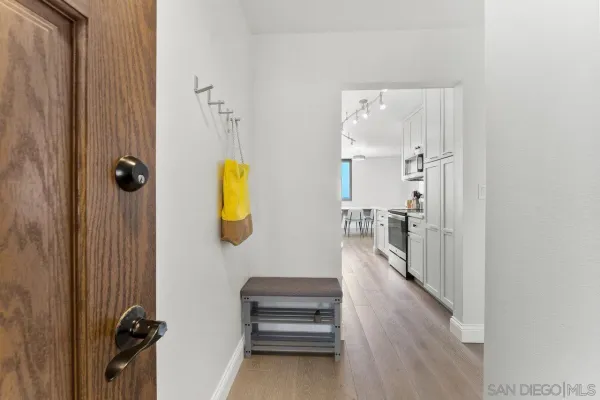 a bathroom with a tub and mirror