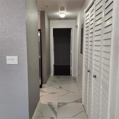 a view of a hallway with a elevator