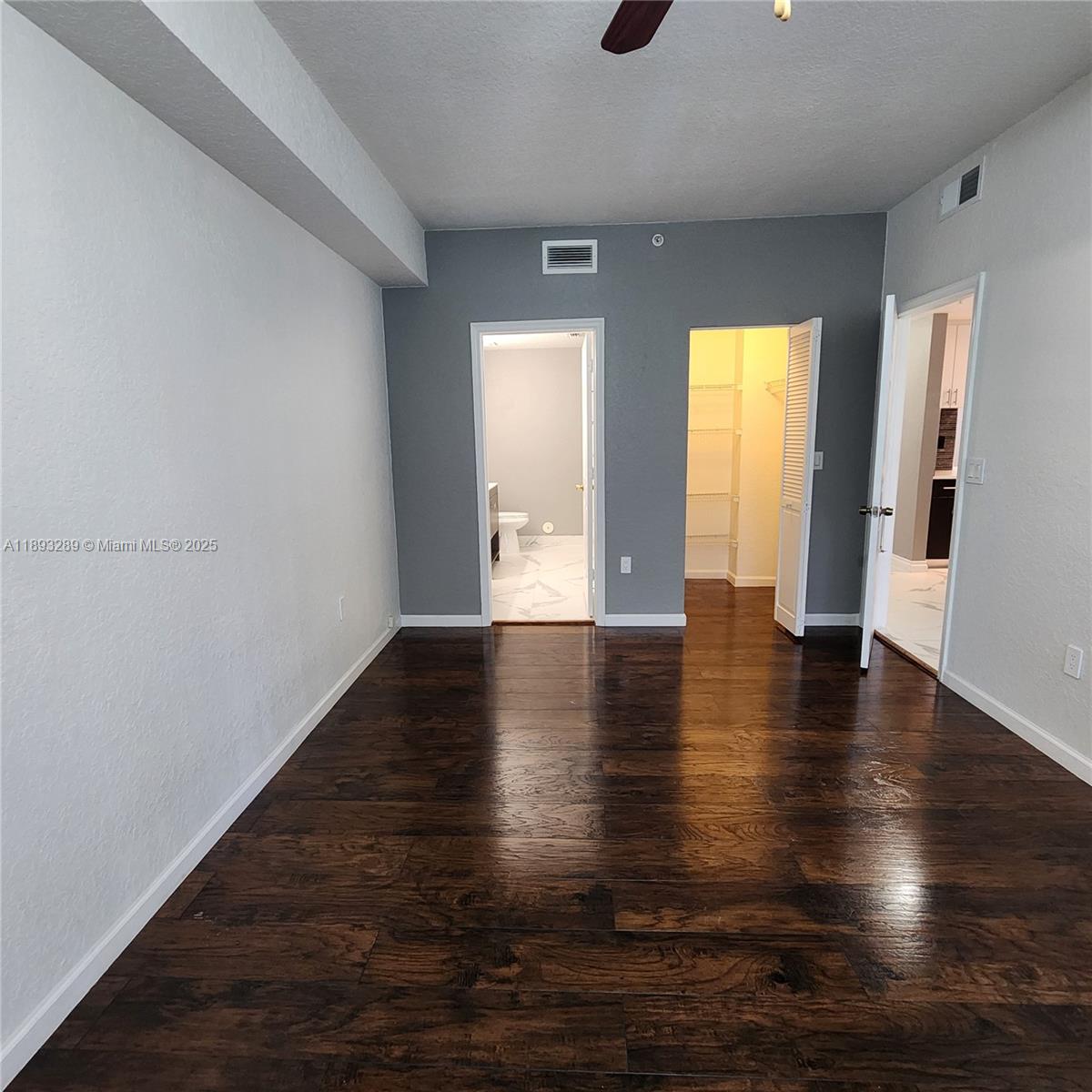 2941 Riverside Drive, Unit 102 Coral Springs, FL 33065 - Photo 25 of 37 a view of a livingroom with wooden floor