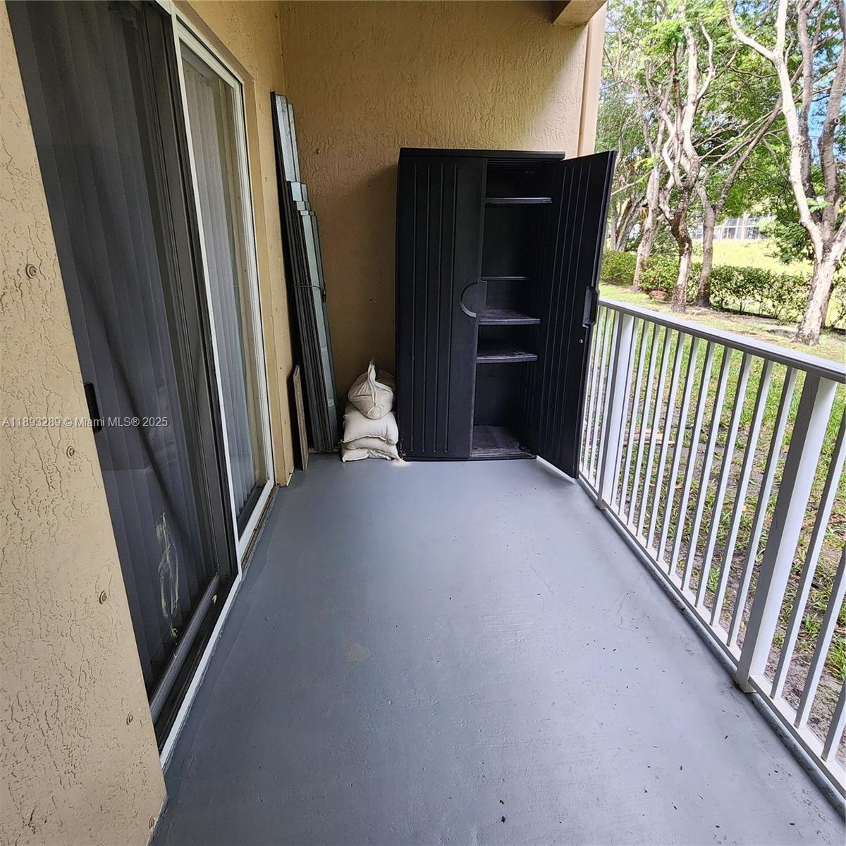 2941 Riverside Drive, Unit 102 Coral Springs, FL 33065 - Photo 32 of 37 a view of a hallway view with staircase