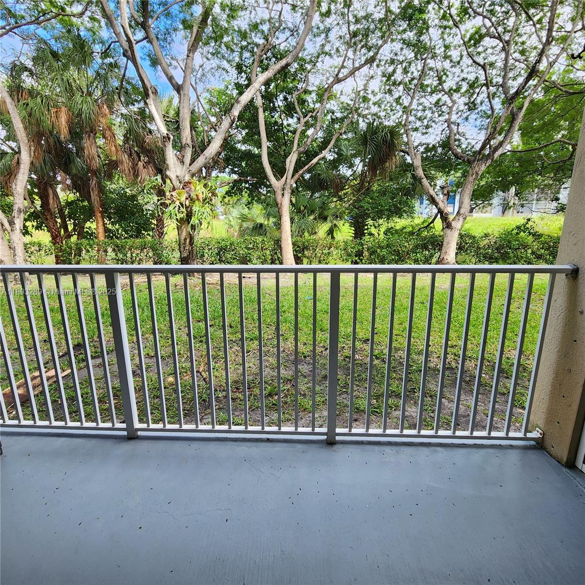 2941 Riverside Drive, Unit 102 Coral Springs, FL 33065 - Photo 33 of 37 a view of balcony