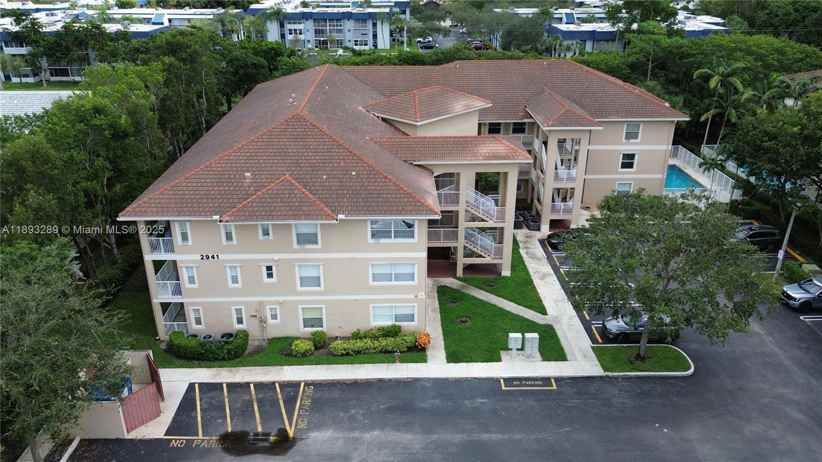 2941 Riverside Drive, Unit 102 Coral Springs, FL 33065 - Photo 36 of 37 an aerial view of a house