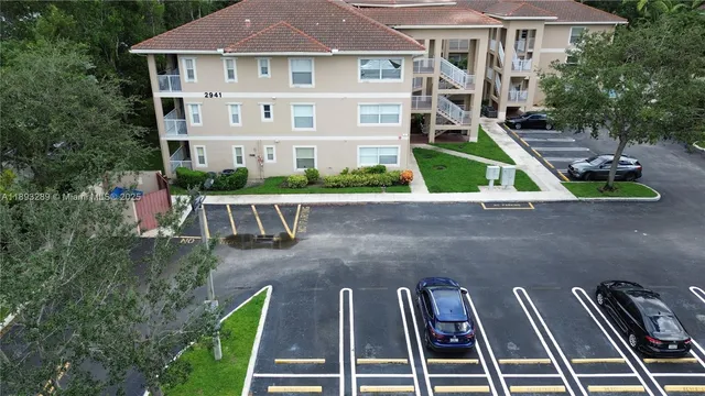 a view of house with yard