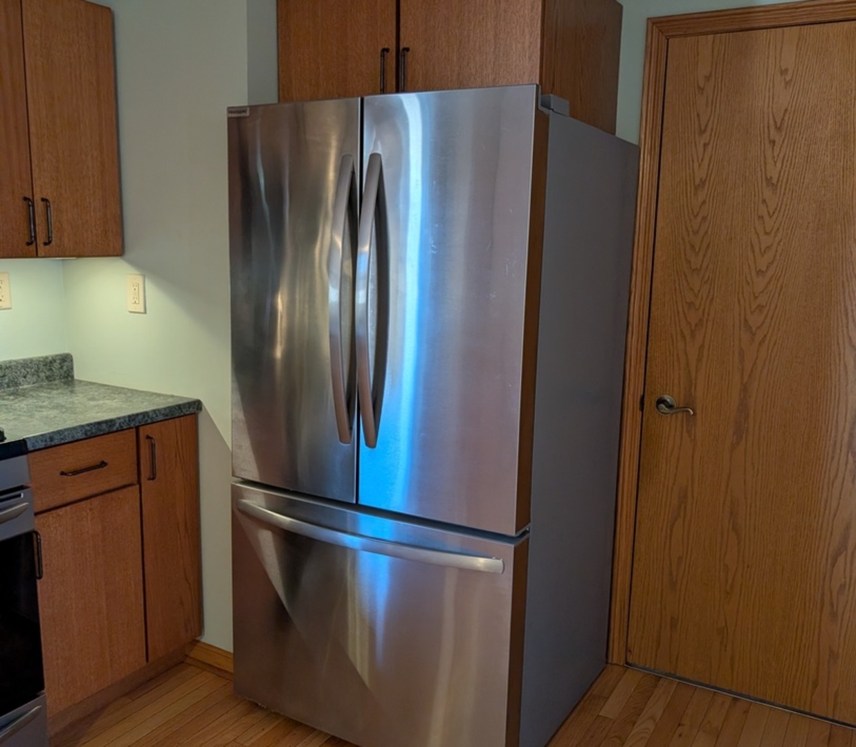 112 Wright Drive Utica, IL 61373 - Photo 5 of 30 a metallic refrigerator freezer sitting in a kitchen