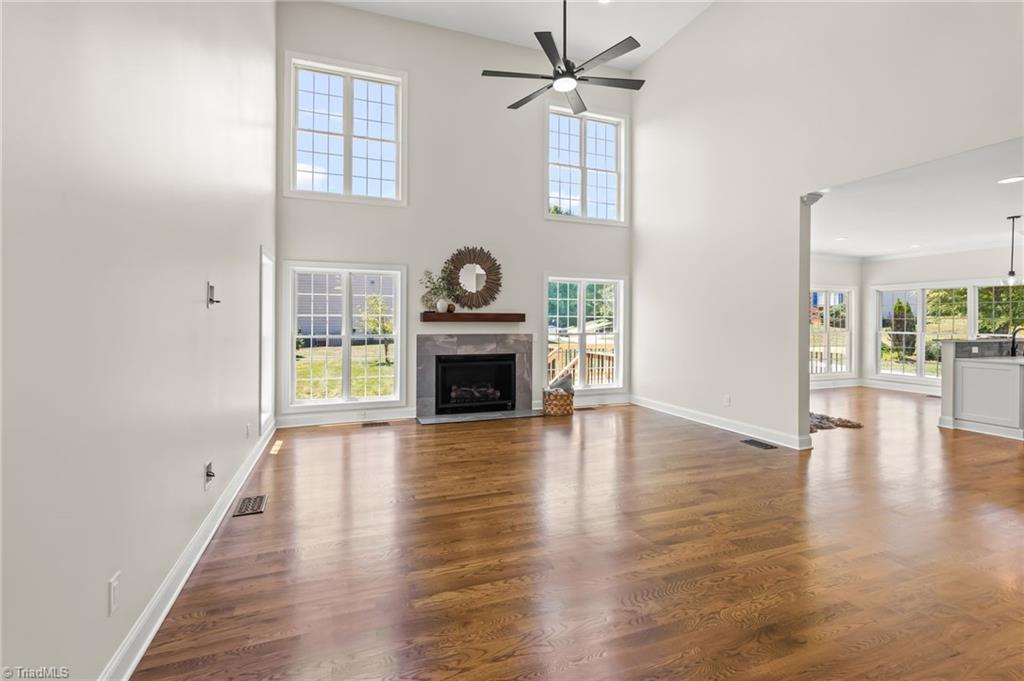 8419 Pheasant Ridge Drive Colfax, NC 27235 - Photo 14 of 49 Gleaming Hardwoods and streaming natural Light!