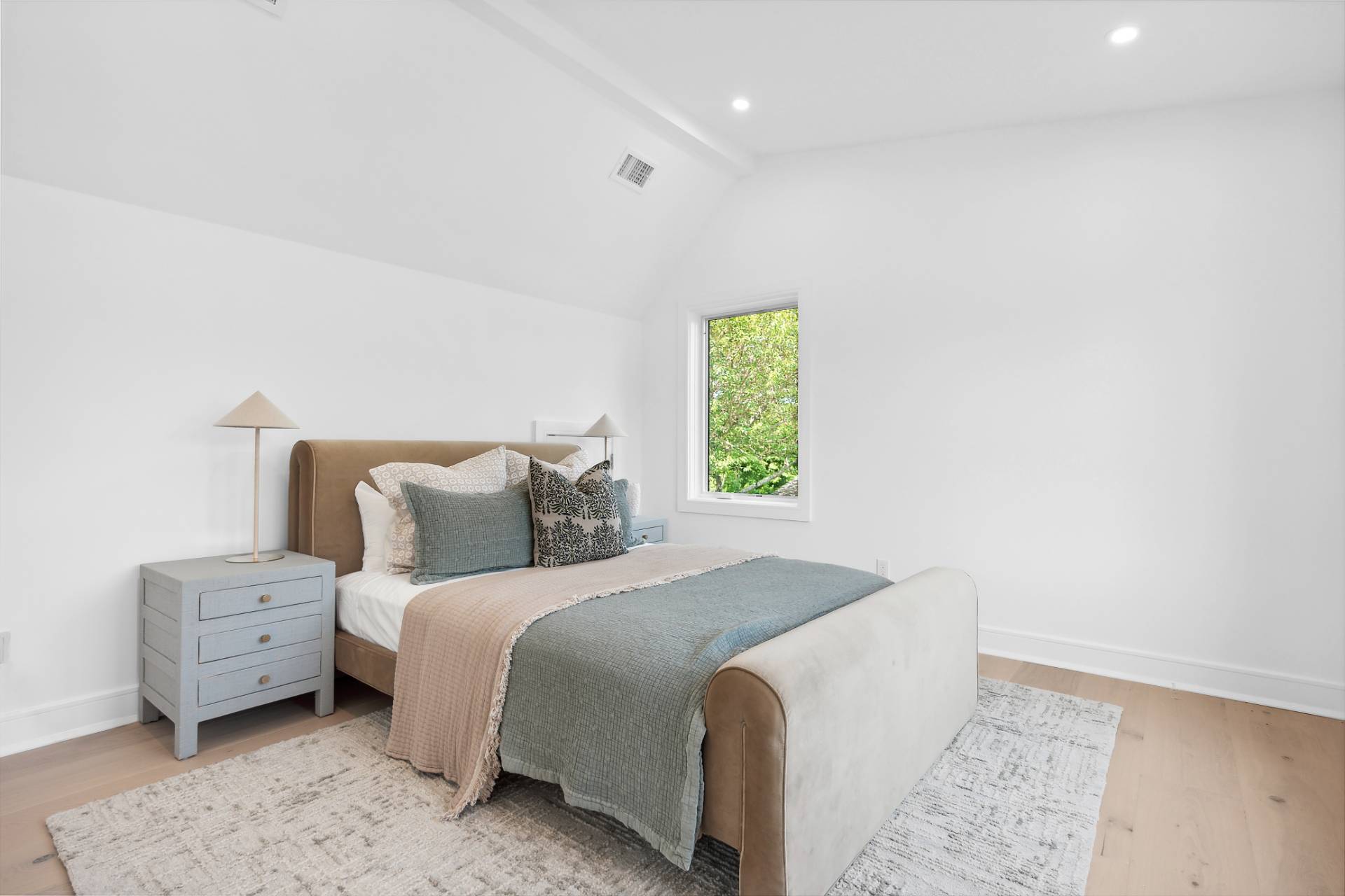 55 Fairview Avenue Montauk, NY 11954 - Photo 13 of 22 a bedroom with a bed and a window