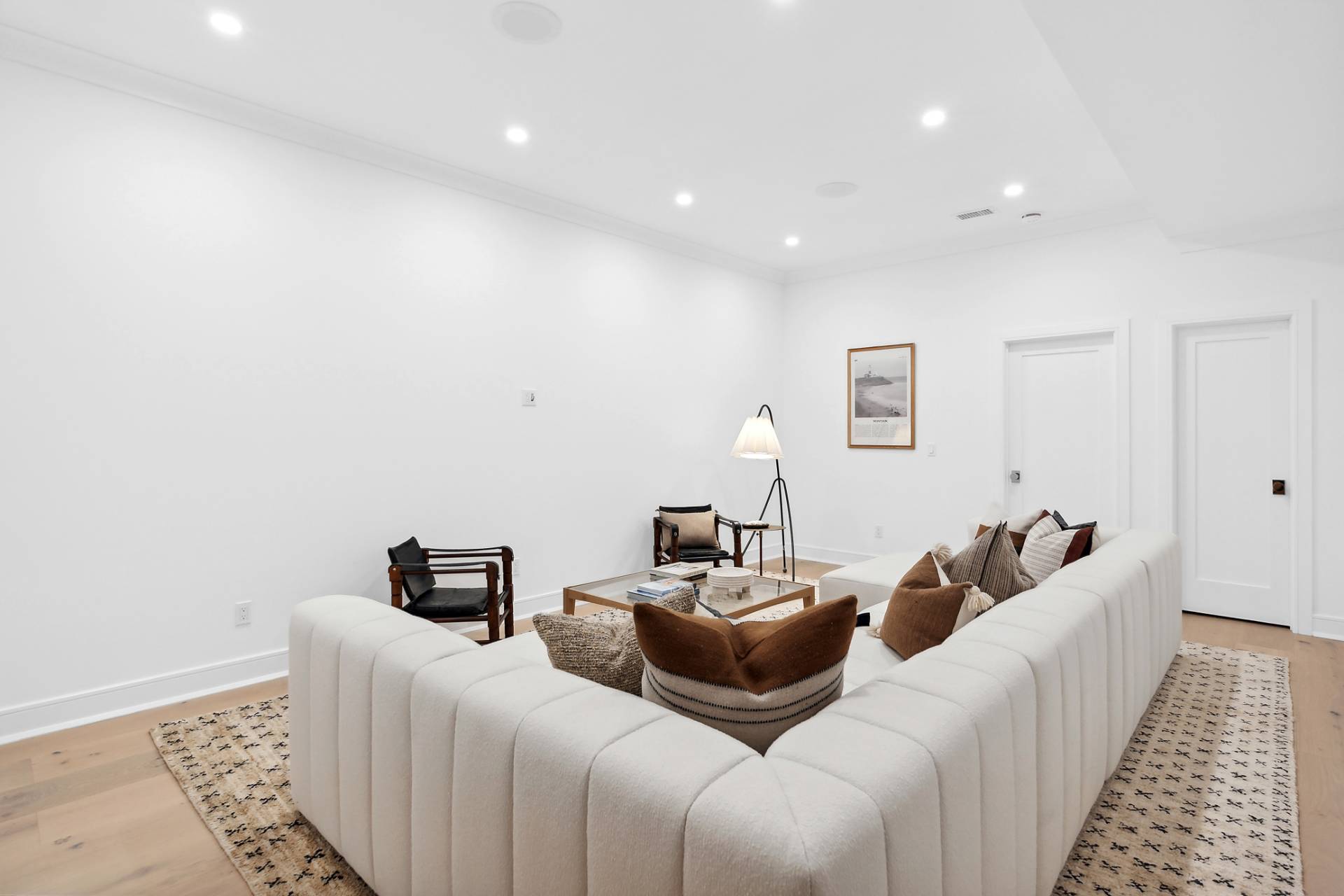 55 Fairview Avenue Montauk, NY 11954 - Photo 14 of 22 a living room with furniture a couch and wooden floor