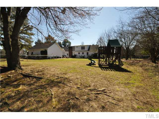 5109 Castlebrook Drive Raleigh, NC 27604 - Photo 22 of 24 Spacious backyard with the lot being .92-acres! Exterior Back