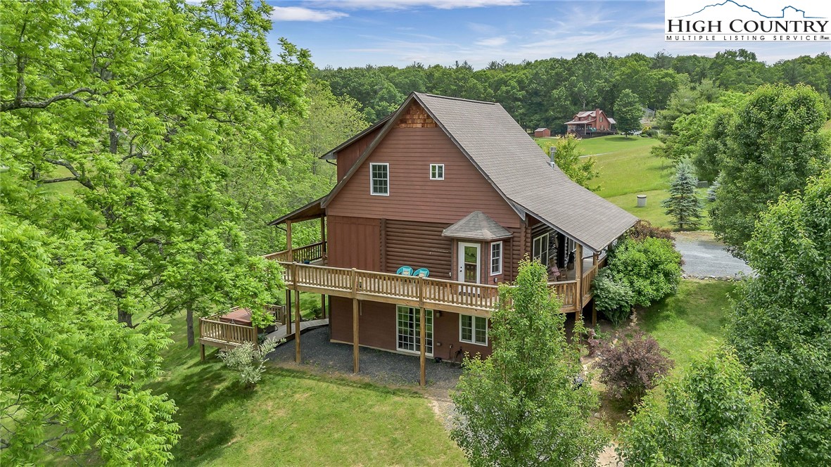 218 Cherokee Circle Jefferson, NC 28640 - Photo 1 of 50 an aerial view of a house with a yard