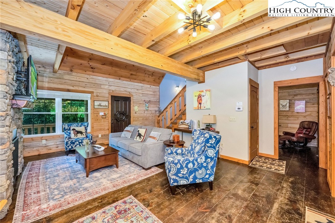 218 Cherokee Circle Jefferson, NC 28640 - Photo 16 of 50 a living room with furniture and a large window