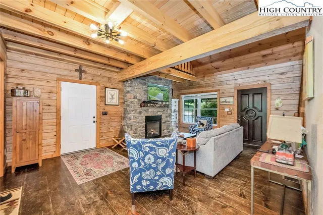 a kitchen with stainless steel appliances a sink a stove and a microwave