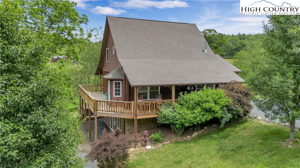218 Cherokee Circle Jefferson, NC 28640 - Photo 2 of 50 front view of a house with a yard