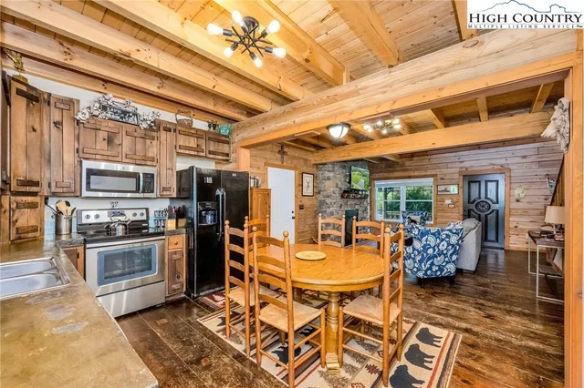 a bathroom with a toilet a sink and a mirror