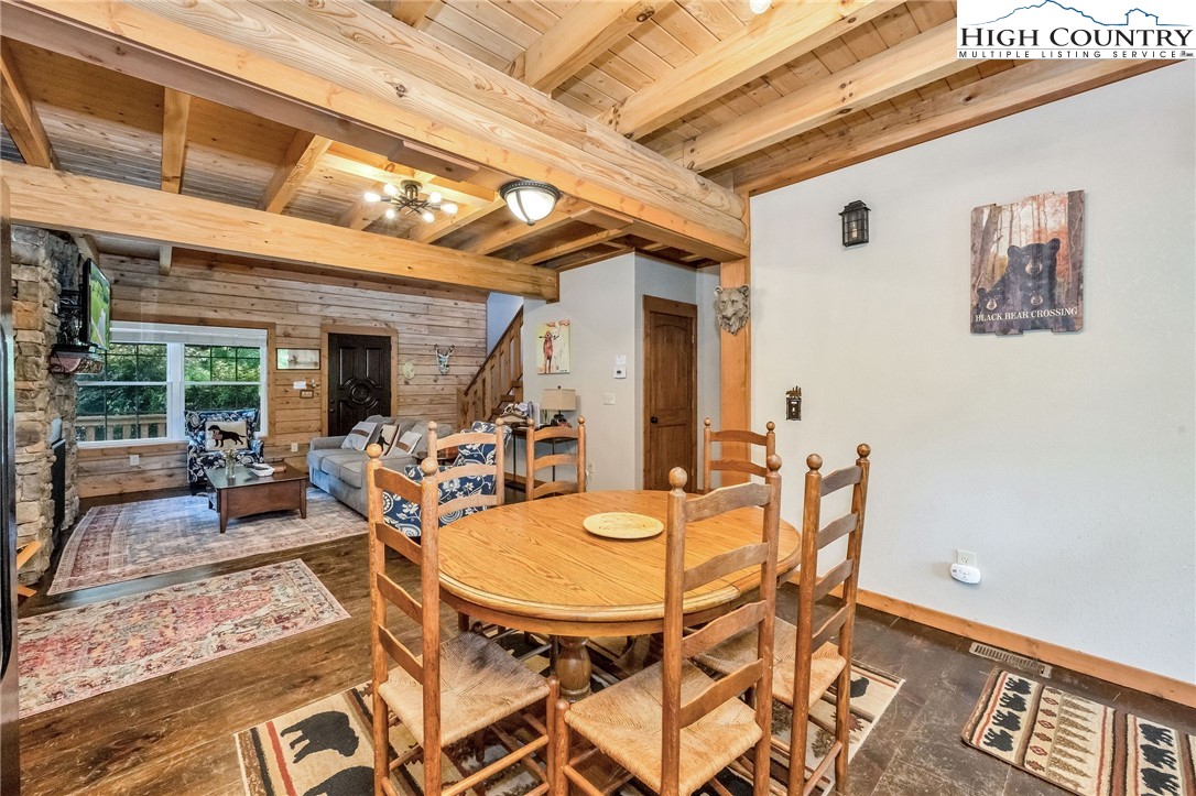 218 Cherokee Circle Jefferson, NC 28640 - Photo 22 of 50 a view of a patio with table and chairs and potted plants
