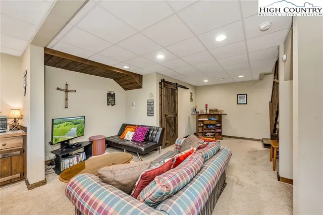 a bed room with a bed and a balcony