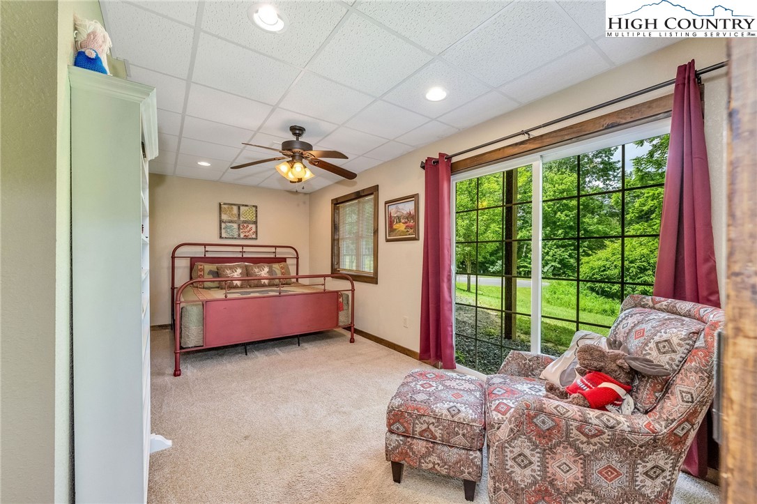 218 Cherokee Circle Jefferson, NC 28640 - Photo 42 of 50 a bed room with a bed and a balcony