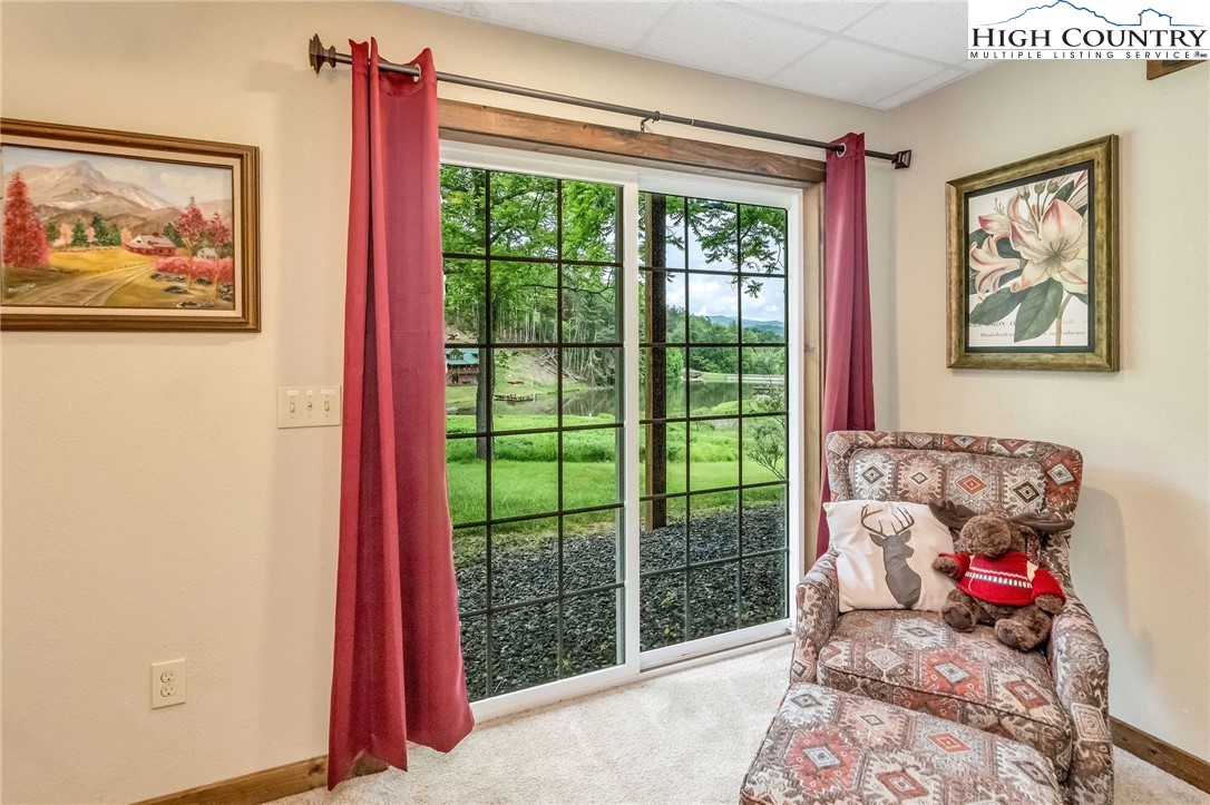 218 Cherokee Circle Jefferson, NC 28640 - Photo 44 of 50 a living room with furniture and a window