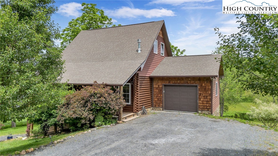 218 Cherokee Circle Jefferson, NC 28640 - Photo 6 of 50 front view of a house with a garage