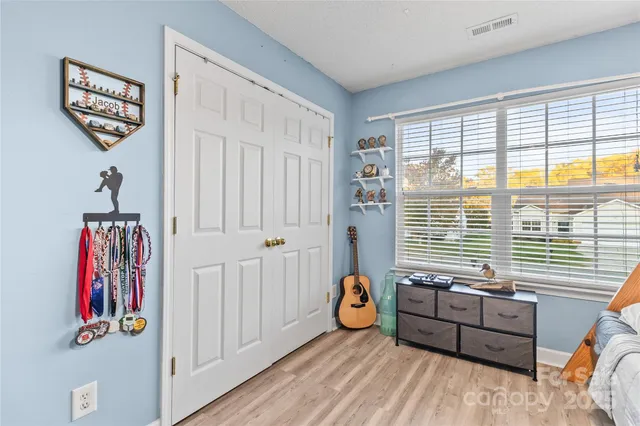 a view of a livingroom with furniture and windows