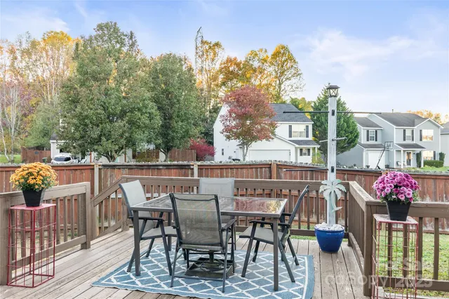a view of a chairs and table on the terrace