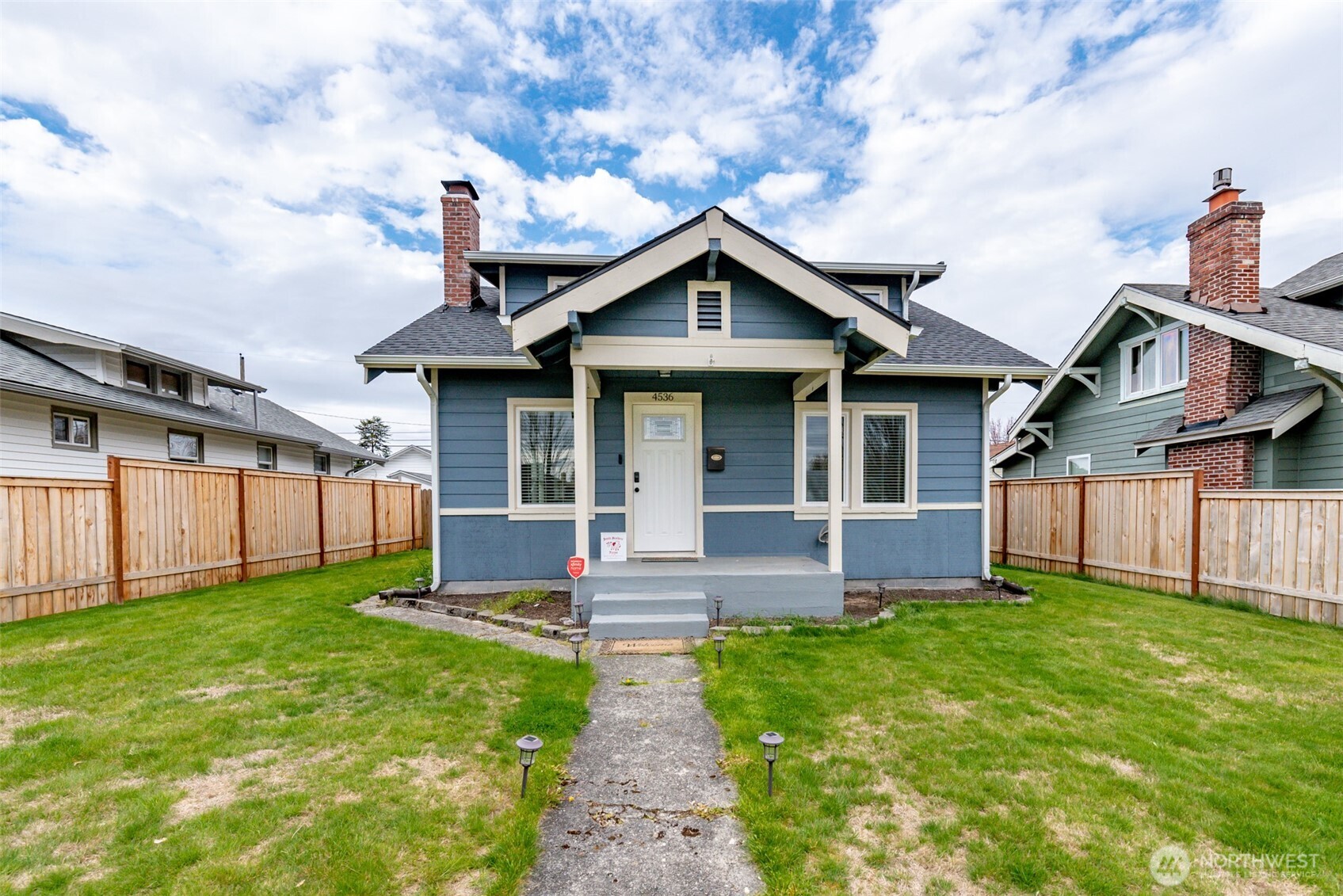 4536 Fawcett Avenue Tacoma, WA 98418 - Photo 1 of 1 a front view of house with yard and green space