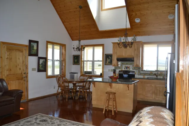 a view of balcony with wooden floor