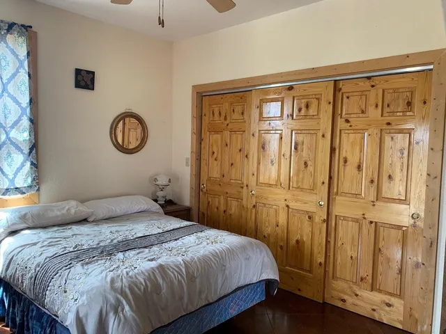 a view of a dry field with a beach