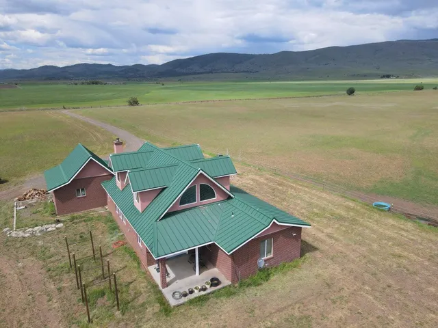 a view of a lake with a yard