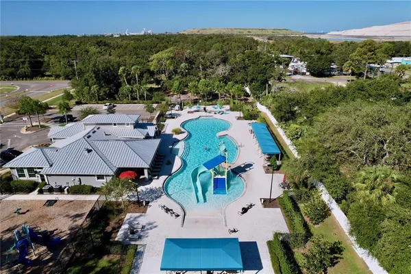 an aerial view of a house with a garden