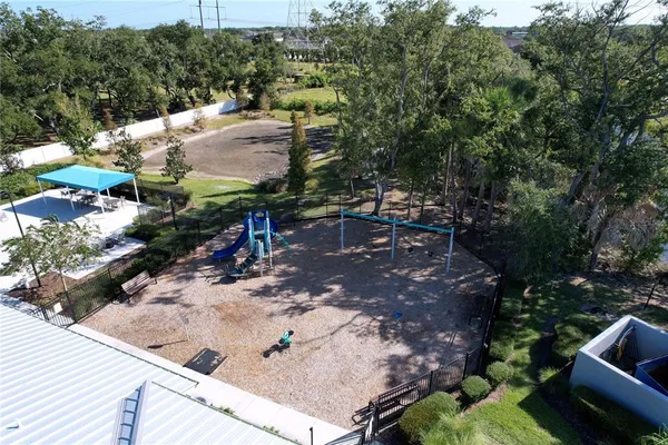 a view of a backyard with sitting area
