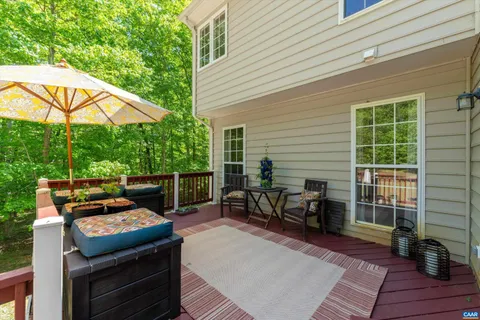 a backyard of a house with seating space
