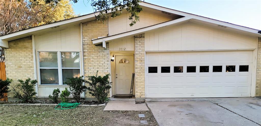 2032 Meadfoot Road Carrollton, TX 75007 - Photo 1 of 1 Ranch-style home with a garage