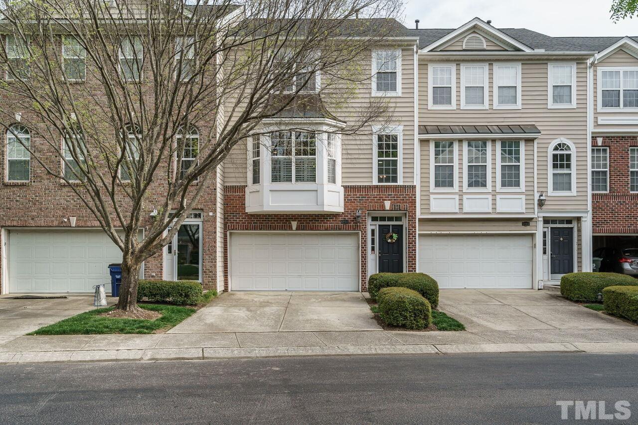 6903 Middleboro Drive Raleigh, NC 27612 - Photo 1 of 26 a front view of a house with garden