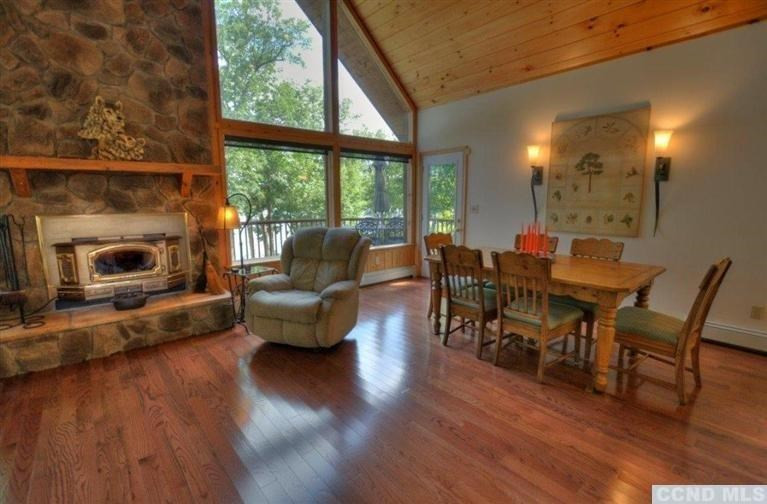 33 Golf Course Road Copake, NY 12521 - Photo 10 of 10 a living room with furniture and a wooden floor