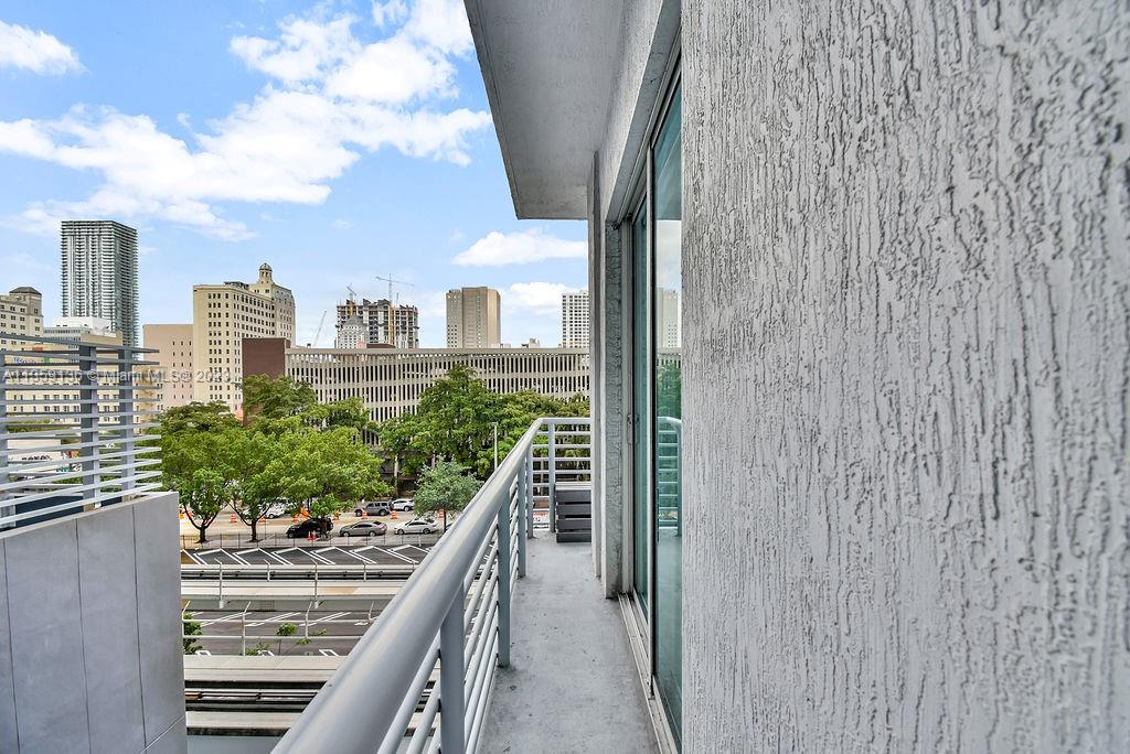 234 Northeast 3rd Street, Unit 507 Miami, FL 33132 - Photo 28 of 48 a view of balcony with wooden floor