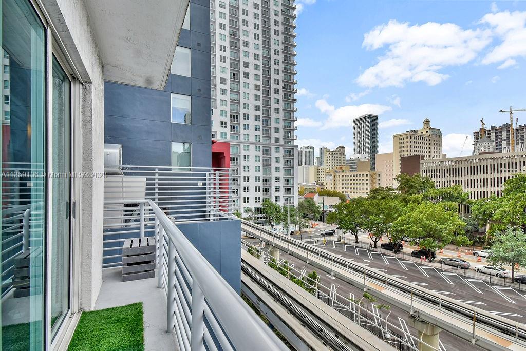 234 Northeast 3rd Street, Unit 507 Miami, FL 33132 - Photo 33 of 48 a city view from a balcony