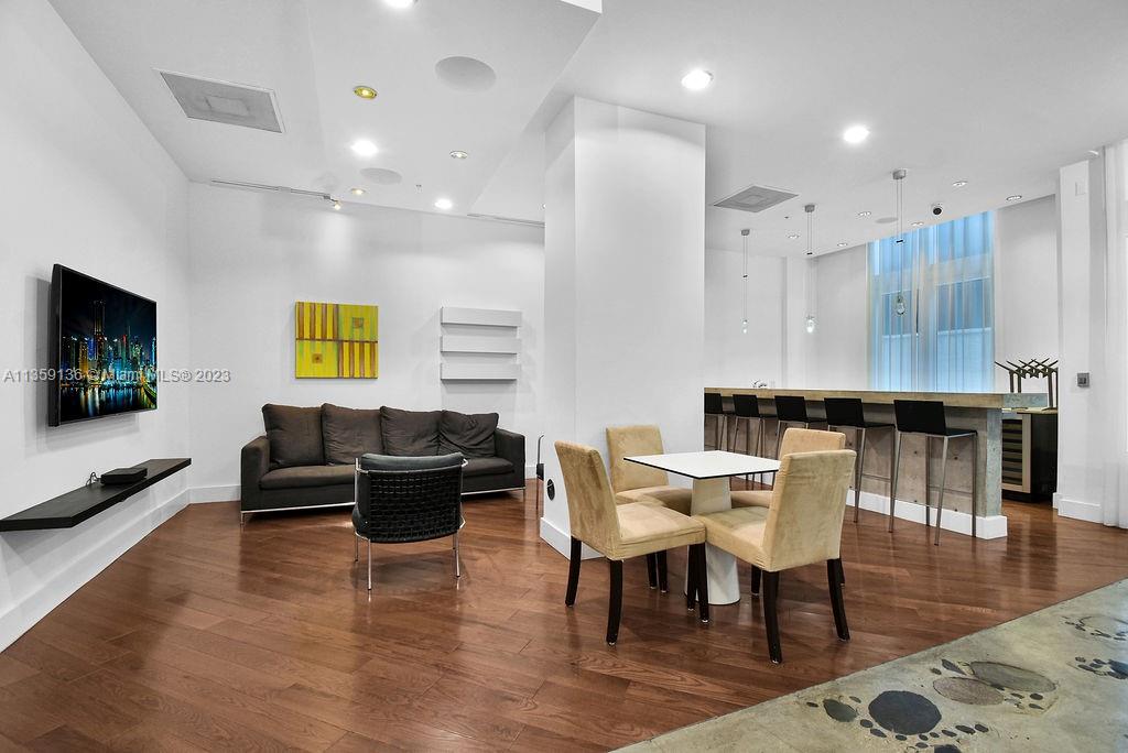 234 Northeast 3rd Street, Unit 507 Miami, FL 33132 - Photo 36 of 48 a view of a dining room with furniture
