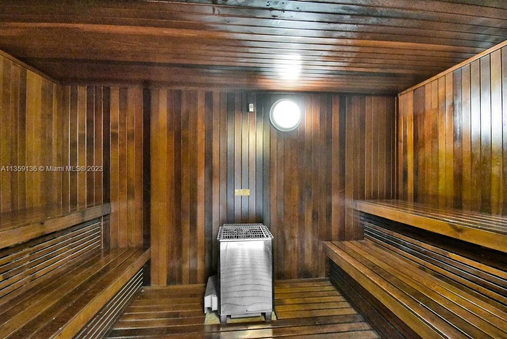 234 Northeast 3rd Street, Unit 507 Miami, FL 33132 - Photo 37 of 48 a view of sitting area with wooden walls