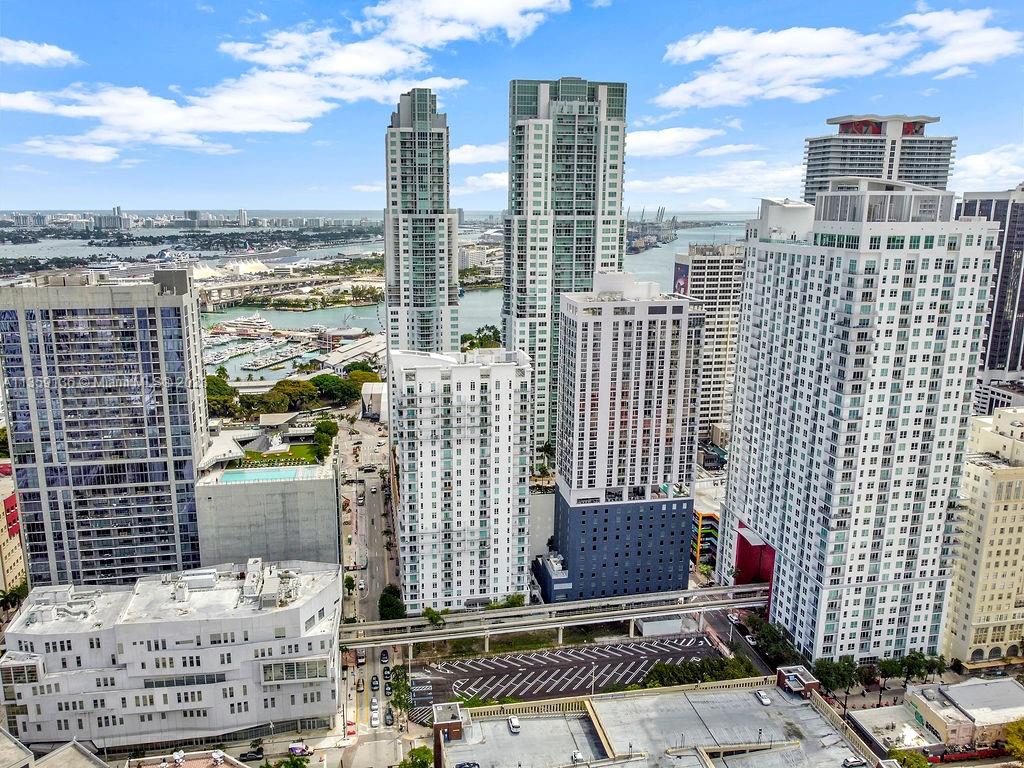 234 Northeast 3rd Street, Unit 507 Miami, FL 33132 - Photo 45 of 48 a view of a city with tall buildings