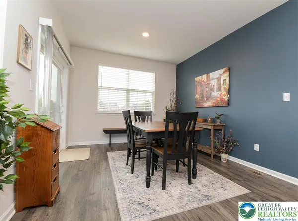 a view of a dining room with furniture
