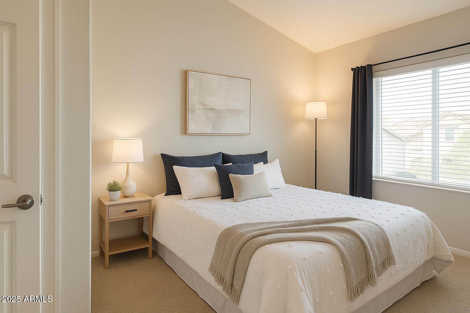 2150 West Alameda Road, Unit 1032 Phoenix, AZ 85085 - Photo 15 of 39 a bedroom with a bed and a window