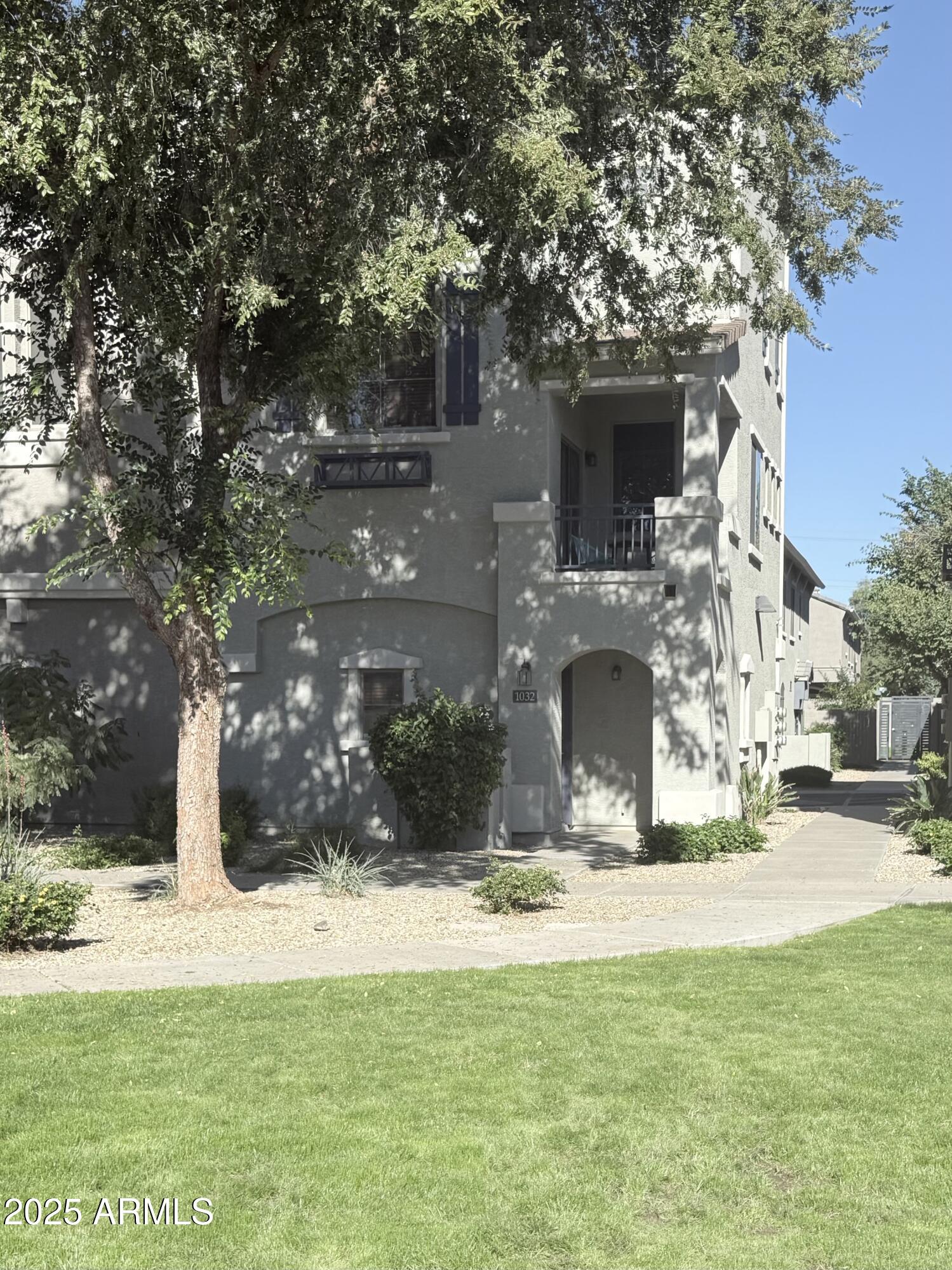 2150 West Alameda Road, Unit 1032 Phoenix, AZ 85085 - Photo 25 of 39 a view of a house with a yard