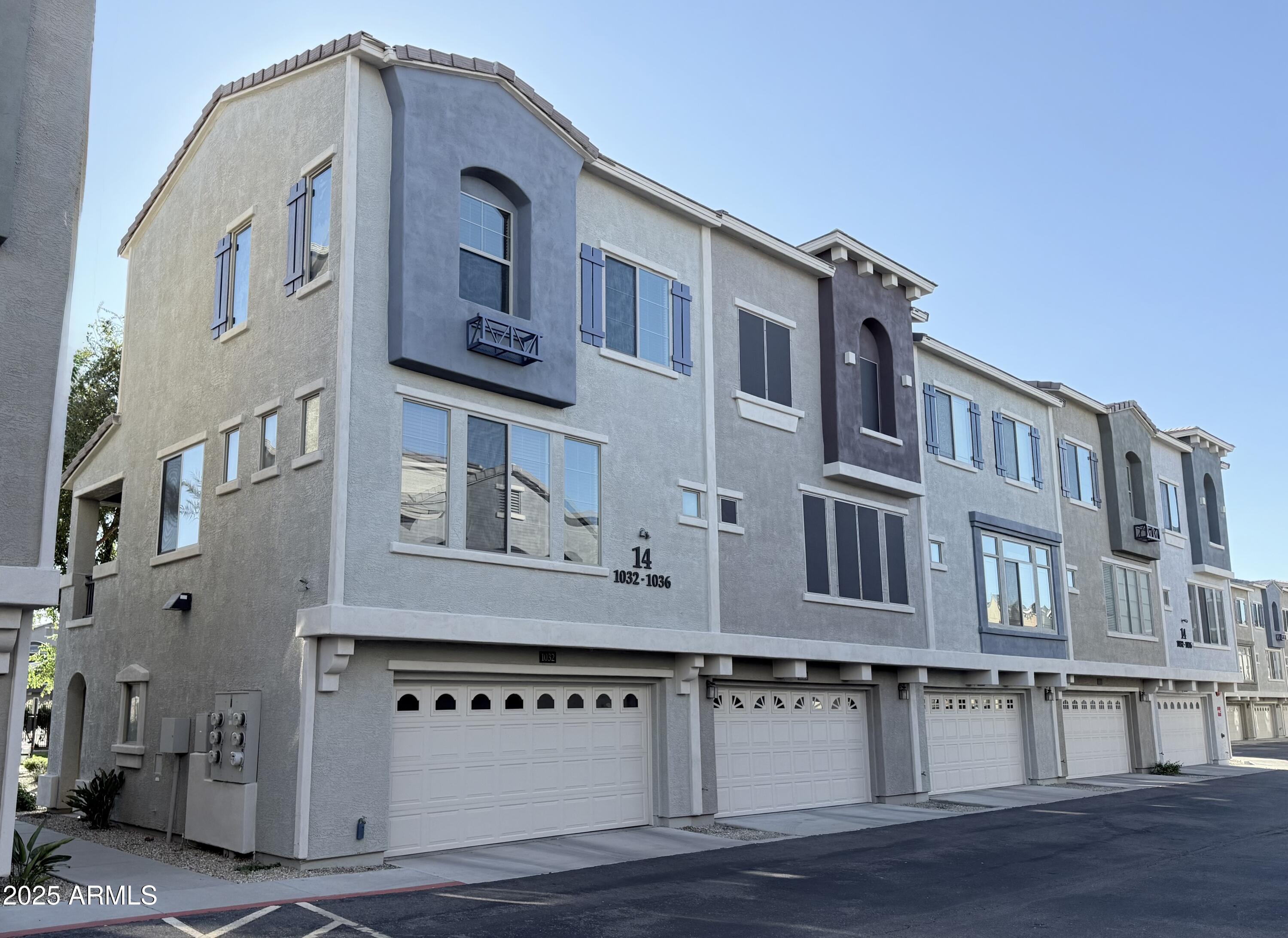 2150 West Alameda Road, Unit 1032 Phoenix, AZ 85085 - Photo 28 of 39 a front view of a building with balcony