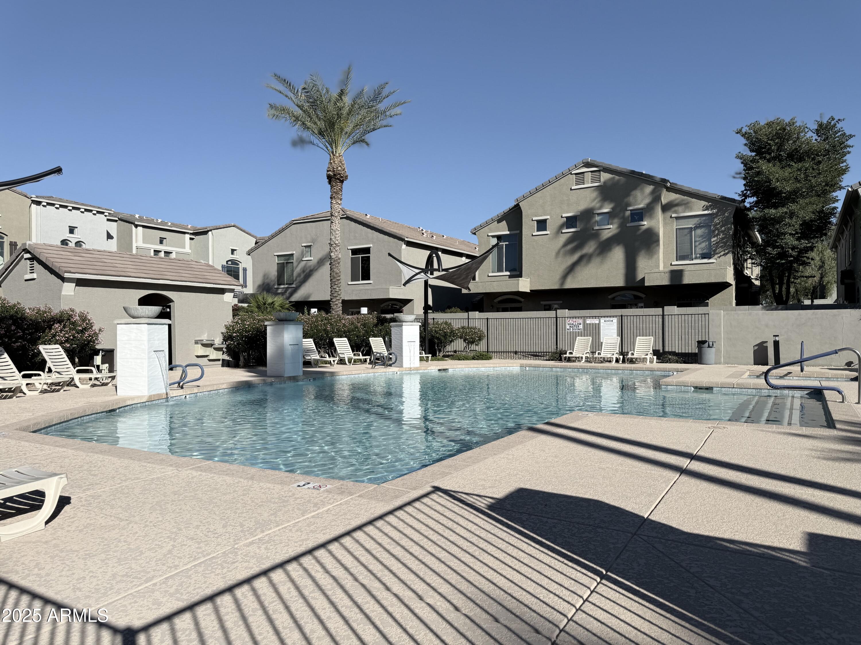 2150 West Alameda Road, Unit 1032 Phoenix, AZ 85085 - Photo 31 of 39 a view of a living room and dining room